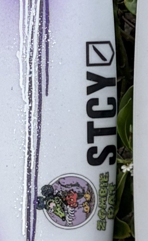 STCY stickers on the rails of my boards